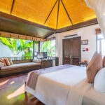 Deluxe Cottage Hillside - Bed & Sitting Area with View